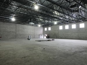 The concrete slab has been poured in the gymnasium and is now curing with the help of the new rooftop HVAC units that are now operational.