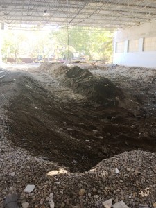 A view of the swimming pool which has been completely removed.